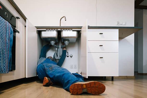 Professional Emergency Plumber technician working in Warrensburg, NY